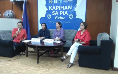 <p><strong>'ERPAT' PROGRAM.</strong> Rachelle Nessia (left) of the Philippine Information Agency (PIA-7) introduces guests of the 'Kapihan sa PIA' forum to talk about the Empowerment and Reaffirmation of Paternal Abilities (ERPAT) program. They are ERPAT regional officer Kevin Rodriguez (second from left) and Department of Social Welfare and Development-7 focal person on Family Daisy Lor. With them is forum co-host Annabelle Lagrosas (right) of Radyo Pilipinas. <em>(Photo by Luel Galarpe)</em></p>