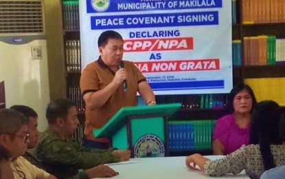 <p><strong>NPA REJECTED.</strong> Mayor Armando Quibod of Makilala, North Cotabato (with mic) leads local officials in declaring the New People’s Army as persona non grata in all its 38 villages during a peace and order council meeting on Tuesday, Sept. 17, 2019. <em>(Photo courtesy of Makilala LGU)</em></p>