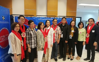 <p><strong>MORE MSMEs.</strong> Department of Science and Technology-Technology Application and Promotion Institute (DOST-TAPI) director Edgar Garcia (second from left) poses with other guests during the "SPICES to DOST LabS" launch at the ADMATEL Building, DOST Compound in Bicutan, Taguig City on Sept. 6, 2019. The promotional activity aims to reach out more micro, small and medium enterprises (MSMEs) in the country. <em>(Photo courtesy of DOST)</em></p>