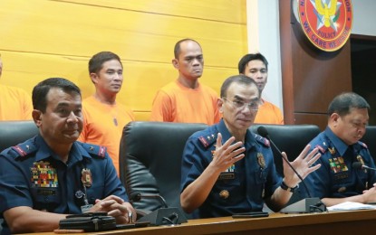 <p><strong>READY FOR MANHUNT.</strong> National Capital Region Police Office (NCRPO) chief, Maj. Gen. Guillermo Eleazar (seated, 2nd from left) announces,  during a press briefing in Camp Bagong Diwa on Thursday (Sept. 19, 2019), the deployment of tracker teams to hunt down 176 persons deprived of liberty (PDLs) in Metro Manila who were released through the Good Conduct Time Allowance (GCTA). President Rodrigo Duterte earlier said PDLs who will refuse to surrender within the 15-day period he has set will be considered fugitives and face arrest.<em> (PNA photo by Christopher Lloyd Caliwan)</em></p>