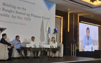 <p><strong>SOCIAL MEDIA-BASED LENDERS.</strong> Bangko Sentral ng Pilipinas Senior Assistant Governor and General Counsel Lawyer Elmore Capule (second from left) answers questions from Central Visayas bankers and stakeholders during the regional information campaign on the amendments of the BSP Charter in Marco Polo Hotel in Cebu City on Friday (Sept. 20, 2019). Capule said they are closely working with the Securities and Exchange Commission in crafting clear-cut policy over lending firms proliferating on social media which shame debtors who fail to settle their debts. <em>(PNA photo by John Rey Saavedra)</em></p>