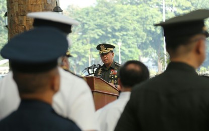 <p><strong>OUTGOING AFP CHIEF.</strong> Outgoing Armed Forces of the Philippines chief-of-staff, Gen. Benjamin Madrigal Jr. thanks all military personnel for their support on his last flag-raising ceremony as military chief at the AFP Headquarters in Camp Aguinaldo, Quezon City Monday (Sept. 23, 2019). He will be replaced by Lt. Gen. Noel Clement. <em>(Photo courtesy of the AFP Public Affairs Office)</em></p>