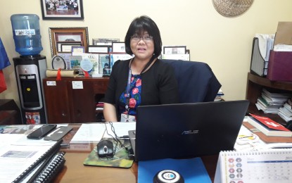 <p><strong>DTI ASSISTANCE.</strong> Edna Dizon, provincial director of the Department of Trade and Industry, talks about the assistance the agency has provided to the various microenterprises and small and medium enterprises in Aurora province. The DTI's assistance, under its Shared Service Facility program, included the provision of machinery and equipment for coconut processing. <em>(File photo by Jason de Asis)</em></p>
