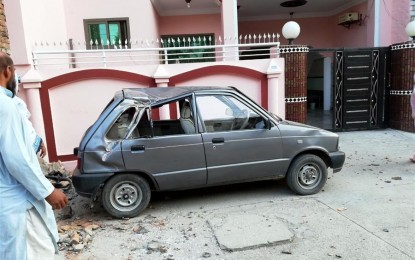 <p><strong>QUAKE IN PAKISTAN</strong>. A mobile phone photo shows a damaged car at the quake-hit area in Mirpur district of Pakistan-controlled Kashmir on Tuesday (Sept. 24, 2019). A 5.8-magnitude earthquake hit parts of Pakistan, killing 21 people and injuring more than 320 others. <em>(Str/Xinhua)</em></p>