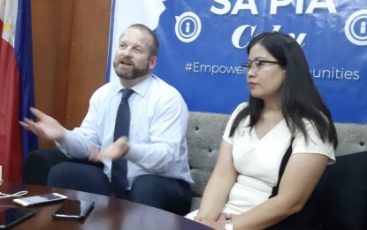 <p><strong>EDUCATION USA.</strong> Matt Keener, cultural attaché of the Education USA Philippines program of the US Embassy, emphasizes a point during an interview with government media at the Philippine Information Agency (PIA)-Central Visayas office in Cebu City on Thursday (Sept. 26, 2019). With him is Irish Concepcion, social science librarian of the University of San Carlos who acts as Education USA-Cebu adviser. <em>(PNA photo by John Rey Saavedra)</em></p>