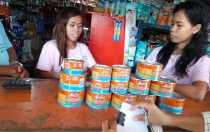 <p><strong>SEIZED.</strong> Some 14 cans of China-made Ma Ling canned luncheon meat are seized from a grocery store in Murcia, Negros Occidental during an inspection of the Provincial African Swine Fever (ASF) Task Force on Friday morning (Sept. 27, 2019). Ma Ling is one of the nine brands listed on the Food and Drug Administration Order 2019-046, which directs all importers, distributors, retail outlets and other dealers to immediately recall all pork meat products imported from countries suspected to be tainted by the ASF virus.<em> (Photo courtesy of NegOcc Provincial ASF Task Force)</em></p>