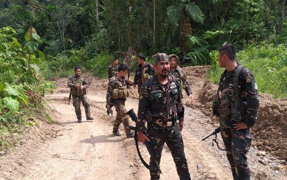 <p><strong>SECURITY PATROL</strong>. Scout rangers of Philippine Army's 78th Infantry Battalion patrolling a remote area in Burauen, Leyte.<em> (PNA photo by Sarwell Meniano)</em></p>