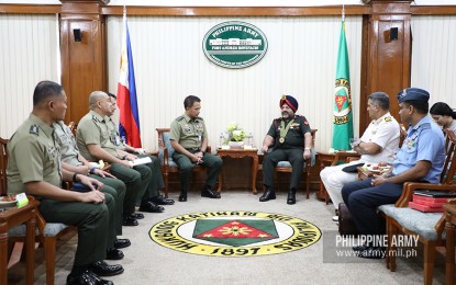 <p><strong>MUTUAL SUPPORT.</strong> Philippine Army vice commander Maj. Gen. Reynaldo M. Aquino (center left) and IAF-AWC 48th Higher Command Course and delegation head, Maj. Gen. Mandip Singh (center right), vow to strengthen each other's capabilities, during a meeting at the Army headquarters in Taguig City on Thursday (Sept. 26, 2019). This includes the conduct of training courses and programs that would enhance both Filipino and Indian troops’ abilities in countering insurgency. <em>(Photo courtesy of the Office of the Army Chief Public Affairs)</em></p>