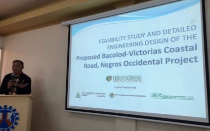 <p><strong>COASTAL ROAD PROJECT.</strong> Engineer Albert Cañete, project manager of Urban Engineers, partner of the DPWH’s Bureau of Design, presents the feasibility study and detailed engineering design of the proposed PHP25-billion Bacolod-Victorias coastal road project in Negros Occidental. The latest update on the project was discussed during the coordination meeting led by Rep. Jose Francisco Benitez at the DPWH-Western Visayas satellite office in Talisay City on Friday (Sept. 27, 2019). <em>(Photo from Rep. Jose Francisco Benitez's Facebook page)</em></p>