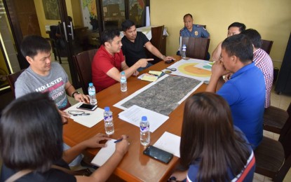 <p><strong>MEASURES VS. ASF</strong>. Pangasinan governor Amado Espino III (second from left) meets with local and national government officials on Saturday (Sept. 28, 2019) after several pigs confiscated in Barangay Baloling Mapandan town tested positive of African Swine Fever.  Espino urged stricter security in entry points to prevent illegal hog traders from bringing in hogs from other provinces.<em> (Photo from Pangasinan Facebook page)</em></p>