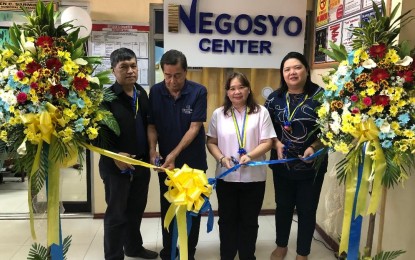 <p><strong>NEGOSYO CENTER</strong>. Angat Mayor Leonardo de Leon (2nd from left) and DTI Region 3 Director Judith Angeles (2nd from right) lead the opening of Negosyo Center in Angat, Bulacan last Sept. 28, 2019.  This is the 16th Negosyo Center in Bulacan and the 97th in Central Luzon. <em>(File photo courtesy of DTI Bulacan)</em></p>