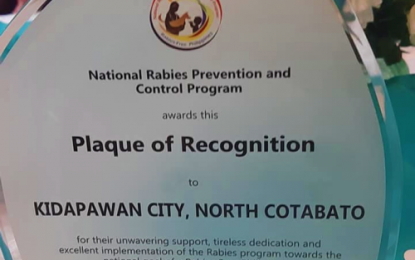 <p><strong>BEST VS. RABIES.</strong> The plaque of recognition received by Kidapawan City as the nation’s best anti-rabies implementer during the recognition night sponsored by the Department of Health in Pasay City on Monday (Sept. 30, 2019). The city has recorded a zero-rabies death case for the past five years. <em>(Photo courtesy of Kidapawan CIO)</em></p>
