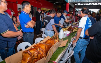 <p><strong>TASK FORCE VS. ASF.</strong> Officials of Angeles City hold a "lechon festival" last Sept. 20 to show that pork being sold in the local markets is clean and safe for consumption. City Mayor Carmelo Lazatin Jr. issued an executive order creating a task force against African Swine Fever (ASF) on Tuesday (Oct. 1, 2019). <em>(File photo from Angeles City PIO)</em></p>