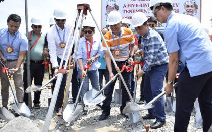 <p><strong>HOUSING FOR THE POOR.</strong> Lucena Mayor Roderick Alcala (3rd from right) and Social Housing Finance Corp. chief Arnulfo Cabling (2nd from right) lead the groundbreaking ceremony for a 625-unit tenement, the first in Southern Tagalog, on Thursday (Oct. 3, 2019). Alcala said the project will prioritize indigent families living in high-risk areas in the city. <em>(Photo by Belinda M. Otordoz)</em></p>
