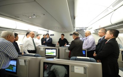 <p><strong>BOUND FOR SOCHI.</strong> President Rodrigo Roa Duterte discusses matters with the members of his delegation while on board a plane bound for Sochi, Russia on October 2, 2019. Duterte met with Russian Prime Minister Dmitry Medvedev in Moscow on Wednesday (Oct. 2) and is set to hold a separate bilateral meeting with Russian President Vladimir Putin in Sochi. <em>(Presidential Photo)</em></p>