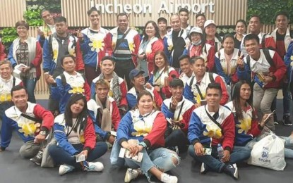 <p><strong>PHILIPPINES’ PRIDE.</strong> Mayor Rhumyla Nicor-Mangilimutan (seated, center) poses with the Bailes de Luces performers who won first place in the foreign category of the Wonju Dynamic Dancing Carnival in Wonju City, South Korea last month. The dance team will return to South Korea in May next year to perform in the Seoul Lotus Lantern Festival, she said on Wednesday (Oct 2, 2019). <em>(Photo courtesy of Mayor Rhumyla Nicor-Mangilimutan)</em></p>