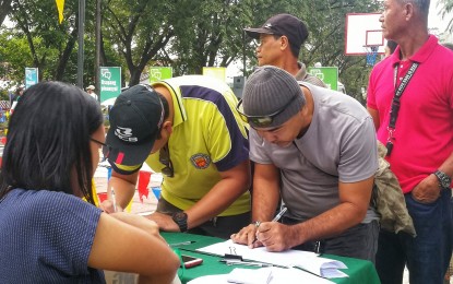 <p><strong>ENHANCING FARMERS' COMPETITIVENESS.</strong> Farmers, extension workers and other rice stakeholders register to participate in the 'Lakbay Palay' event of the Philippine Rice Research Institute (PhilRice) in the Science City of Muñoz, Nueva Ecija. The bi-annual event that kicked off on Thursday (Oct. 3, 2019) aims to teach new technologies that will increase the farmers’ rice yield while reducing production costs.<em> (Photo by Philippine Rice Research Institute)</em></p>