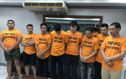 <p><strong>ARRESTED.</strong> PNP-AKG operatives present eight suspects, including five Chinese nationals, in the abduction of two former POGO workers in Taguig City on Friday (Oct. 4, 2019). The victims were abducted near a hotel in Pasay last September 27 and were brought into the POGO office where they were rescued earlier this week. <em>(Photo courtesy: NCRPO PIO)</em></p>