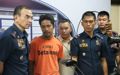 <p><strong>ASG-SUB LEADER ARRESTED.</strong> NCRPO chief, Maj. Gen. Guillermo Eleazar (left) presents to the media ASG sub-leader Ibrahim Lambog Mullo (2nd from left) on Friday (Oct. 4). Mullo was arrested in a joint operation by the police and military in Barangay Batasan Hills on September 27. <em>(Photo courtesy of NCRPO PIO)</em></p>