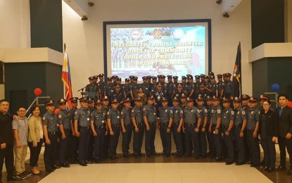 <p><strong>TOURIST-FRIENDLY.</strong> Some 50 policemen attend a ceremony after completing the Tourist-Oriented Police for Community Order and Protection (TopCop), held at the Police Regional Office 8 (Eastern Visayas) headquarters in Palo, Leyte on Friday (Oct. 4, 2019). They will be added to the list of 148 integrated TopCop graduates designated as tourist police assigned to all police stations with tourist destinations. <em>(Photo courtesy of the Department of Tourism)</em></p>