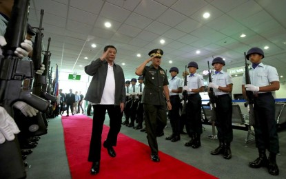 <p><strong>RUSSIA VISIT</strong>. President Rodrigo Roa Duterte is accorded foyer honors upon his arrival from his successful visit to Russia at the Francisco Bangoy International Airport in Davao City on Oct. 6, 2019. Duterte’s spokesperson Salvador Panelo on Monday (Oct. 7) said stronger Philippines-Russia ties will not affect US-PH relations.<em> (Presidential Photo)</em></p>