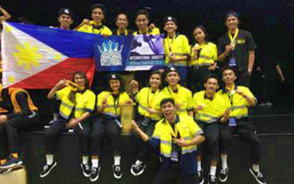 <p><strong>DANCE CHAMPIONS.</strong> The “Off Limits” group from Kidapawan City emerged as dance champions during the Oct. 6 World Supremacy Battle Ground Competition held in Australia. The group took home the gold trophy for the contest’s varsity category. <em>(Photo courtesy of Dave Cazenas – Off Limits team captain)</em></p>