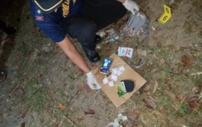 <p><strong>SHABU.</strong> A police investigator conducts an inventory of the suspected shabu recovered from target-listed pusher from Maguindanao province identified as Omar Abdulrahim Abag, 21, who was subjected to a buy-bust operation in General Santos City on Tuesday night (October 8, 2019). Police say the suspect was killed after engaging operatives in a shootout. <em>(PNA photo by Richelyn Gubalani)</em></p>