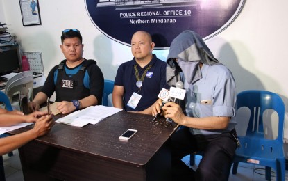 <p><strong>DELINQUENT EMPLOYERS WARNED.</strong> The Police Regional Office 10 (Northern Mindanao) presents Bienvenido Macaraeg Jr., a proprietor of Sunny Farm, following his arrest in Cagayan de Oro City on Wednesday (Oct. 9, 2019) Macaraeg was arrested for his alleged failure to remit the SSS contributions of his employees. <em>(Contributed photo)</em></p>