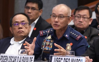 <p><strong>SENATE PROBE.</strong> Philippine National Police chief, Gen. Oscar Albayalde, explains his side on his alleged involvement in the recycling of confiscated illegal drugs during the Senate hearing on Wednesday (Oct. 9, 2019). Malacañang said President Rodrigo Duterte will decide on Albayalde’s fate based on Department of the Interior and Local Government (DILG) Secretary Eduardo Año’s recommendations after the probe. <em>(PNA photo by Avito C. Dalan)</em></p>