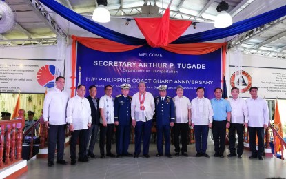 <p><strong>MORE PCG PERSONNEL.</strong> PCG Commandant, Admiral Elson Hermogino (7th from left), DOTr Secretary Arthur Tugade (6th from left), PCG Vice Admiral Joel Garcia (5th from left) and other officials pose for a photo during the 118th anniversary celebration of the PCG on Thursday (Oct. 10) at the PCG headquarters in Port Area, Manila. Hermogino said President Rodrigo R. Duterte’s mandate to have 36,000 PCG personnel is possible within the next three years.<em> (PNA photo by Raymond Carl Dela Cruz)</em></p>