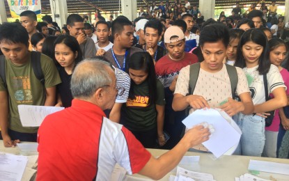 CHED distributes notices of awards to 759 Ilocos Norte scholars ...