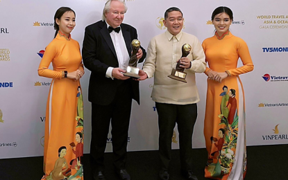 <p style="text-align: left;" align="center"><strong>TOURISM AWARDS.</strong> Department of Tourism Undersecretary Arturo Boncato Jr. receives the Asia’s Leading Tourism Board and Asia’s Leading Dive Destination awards at the 2019 World Travel Awards on Saturday (Oct. 12). The DOT was hailed as Asia’s Leading Tourism Board after a significant increase in the country’s visitor arrivals has been recorded in the past year. <em>(Photo courtesy of DOT)</em></p>