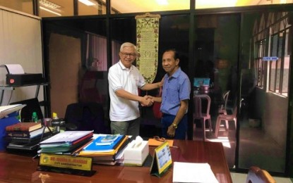 <p><strong>MODEL FAMILY MAN.</strong> Dr. Danda Juanday (left), Cotabato City administrator, on Monday (Oct. 14, 2019) congratulates Surafah A. Campiao, a civil engineer, for bringing honor to Cotabato City after being chosen recently as the regional winner of the Overseas Workers Welfare Administration-Bangsamoro Autonomous Region in Muslim Mindanao (OWWA-BARMM) competition for model families. Campiao will represent Cotabato City and BARMM for the national level competition. <em>(Photo courtesy of Cotabato CIO)</em></p>