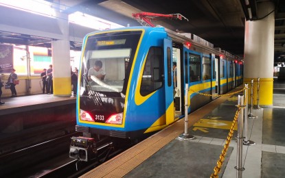 <p><strong>MRT-3 DALIAN TRAIN. </strong>A Dalian train at an MRT-3 station. The MRT-3 management on Wednesday (Sept. 9, 2020) said the inclusion of three Dalian trains in its operational trains brings its maximum number of fielded trains to 19, increasing the MRT-3's passenger capacity and shortening the wait time between trains. (<em>PNA file photo</em>) </p>
