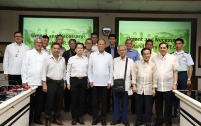 <p><strong>SUPPORT TO ROTC.</strong> Defense Secretary Delfin Lorenzana (4th from left) and other DND officials meet with representatives of the UP Vanguard Inc., Pasig Chapter in Camp Aguinaldo, Quezon City on Monday (Oct. 14, 2019). The group supports the bill seeking to reinstate mandatory ROTC for senior high school students <em>(Photo courtesy of DND Public Affairs Service)</em></p>