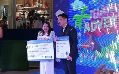 <p><strong>MALLING MORE FUN IN PH.</strong> DOT Secretary Bernadette Romulo-Puyat and SM Supermalls COO Steven Tan lead the launch of Juan Fun Adventure at the SM City San Lazaro in Manila on Tuesday (Oct. 15, 2019). Under the program, social media-worthy dioramas will be on display showcasing various tourist attractions in a bid to encourage mall-goers to travel across the country. <em>(PNA photo by Joyce Rocamora)</em></p>