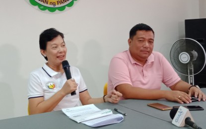 <p><strong>MOTION RECONSIDERED.</strong> Asingan Vice Mayor Heidee Chua (left) and Mayor Carlos Lopez, Jr. (right) heave a sigh of relief upon receiving the decision of the Office of the Ombudsman on their motion for reconsideration on the cases filed against them when they were still mayor and vice mayor, respectively, during a press conference on Wednesday (Oct.16, 2019). They had complied with the suspension order of one year, which has been reduced to one month in a recent order issued by the Ombudsman. <em>(Photo by Liwayway Yparraguirre)</em></p>