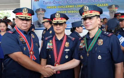 <p><strong>NO GOLF FOR COPS ON WEEKDAYS. </strong>Lt. Gen. Archie Francisco Gamboa, PNP Officer-in-Charge, announces the ban on playing of golf for cops during weekdays, during the change of command ceremony of the NCRPO in Camp Bagong Diwa, Taguig City on Wednesday (Oct. 16, 2019). During the ceremony, Brig. Gen. Debold Sinas (left) formally took over the helm of the NCRPO from Maj. Gen. Guillermo Eleazar (right), who was appointed as Chief of the PNP Directorial Staff. <em>(PNA photo by Joey O. Razon)</em></p>