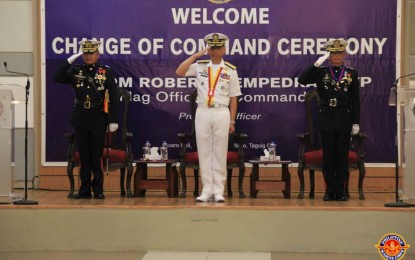 <p><strong>NEW MARINES CHIEF.</strong> Philippine Navy flag-officer-in-command Vice Admiral Robert Empedrad (center) leads the change of command ceremony of the Philippine Marine Corps (PMC) in Fort Bonifacio, Taguig City on Monday (Oct. 14, 2019). Maj. Gen. Nathaniel Casem (right) replaced Maj. Gen. Alvin A. Parreño (left) as the new PMC commandant. <em>(Photo courtesy of PMC PIO)</em></p>
