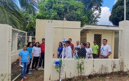 <p><strong>WATER SYSTEM.</strong> Officials of Barangay Tagbinonga in Mati City accept the PHP4.1-million potable water system on Wednesday (Oct. 16, 2019). The project is funded by the World Bank through the Philippine Rural Development Project. <em>(Photo from Mati CIO)</em></p>