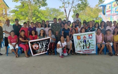 <p><strong>PEACE FORUM VS. CPP-NPA.</strong> Parents and teachers of students of the Nampicuan National High School attend the campus peace forum conducted by the Army's 69th Infantry (Cougar) Battalion in Barangay Cabawangan, Nampicuan, Nueva Ecija on Monday (Oct. 14, 2019). The forum aims to counter the recruitment efforts of the Communist Party of the Philippines-New People’s Army (CPP-NPA), particularly among students. <em>(File photo courtesy of the Philippine Army's 7th Infantry Division)</em></p>