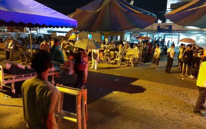 <p><strong>RUSH TO SAFETY.</strong> Patients at the Kidapawan Doctors Hospital were rushed out of the hospital building following the magnitude 6.3 quake that hit North Cotabato province on Wednesday (Oct. 16, 2019) night. The patients were temporarily housed in tents by the roadside near the hospital pending damage assessment by local authorities. <em>(File photo courtesy of Romeo Elusfa – Joy FM Kidapawan)</em></p>