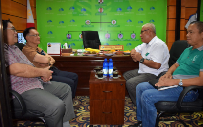 <p><strong>POWER WOES.</strong> Bangsamoro Autonomous Region in Muslim Mindanao (BARMM) Environment Minister Abdulrauf Macacua (extreme left) and BARMM parliament member Tocao Mastura meet with National Grid Corp. of the Philippines officials Mendelson E. Saludo, Right-of-Way Officer (inner right); and Fermin T. Manos, Transformer Line supervisor (extreme right), on how to improve power supply in Maguindanao. The NGCP officials promised to solve the problem with the purchase of power supplies to improve the agency’s services in the province. <em>(Photo courtesy of MENRE-BARMM)</em></p>