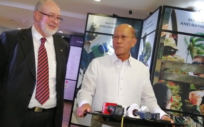 <p><strong>AFP-DITO TELCO DEAL.</strong> Department of National Defense (DND) Secretary Delfin Lorenzana (right) says he sees nothing wrong with the co-location memorandum of agreement (MOA) signed by the Armed Forces of the Philippines (AFP) with Dito Telecommunity (formerly Mindanao Islamic Telephone Company), on the sidelines of the launch of the "Mateship and Bayanihan: The Story of Philippine-Australian Defense Ties" exhibit on Thursday (Oct. 17, 2019). Based on the agreement, the AFP will determine specific locations with its rental value for use of Dito Telecommunity in the installation and management of its communications sites without undermining the operations of affected AFP units. <em>(PNA photo by Lade Jean Kabagani)</em></p>