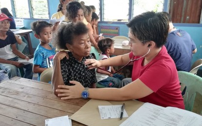<p><strong>CARE FOR IPs.</strong> A member of the Ati community in San Enrique, Iloilo gets free medical check-up during the medical and dental mission facilitated by the National Commission on Indigenous Peoples (NCIP) in Barangay Dacal, San Enrique, Iloilo on Thursday (Oct. 17, 2019). The event was held in celebration of the 22nd anniversary of the Indigenous Peoples Rights Act of 1997 and the National IP Month this October. <em>(PNA photo by Perla G. Lena)</em></p>