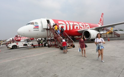 <p>(<em>AirAsia photo courtesy of Manila International Airport Authority</em>) </p>