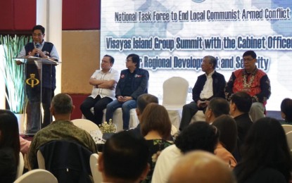 <p><strong>EFFORTS VS. INSURGENCY.</strong> Presidential Assistant for the Visayas Secretary Michael Lloyd Dino (third from left, seated) listens as National Security Adviser Secretary Hermogenes Esperon, vice chair of the National Task Force to End Local Communist Armed Conflict, delivers a message during the Visayan Island Group Cabinet Officers for Regional Development and Security Summit in Cebu City on Wednesday (Oct. 16, 2019). Dino commended the efforts of the Regional Task Forces to End Local Communist Armed Conflict in addressing insurgency problem in Negros Island. <em>(Photo contributed by Danjick Lim)</em></p>