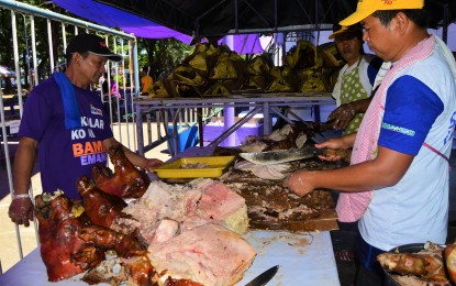 <p><strong>TEMPORARY BAN.</strong> Pig roasters showcase their food products during a "pork festival" organized by the Misamis Oriental provincial government sometime in October last year. Gov. Yevgeny Vincente Emano on Tuesday (Feb. 4, 2020) declares a temporary ban on pork products from Davao Region following the African swine fever outbreak in Davao Occidental province. <em>(PNA file Photo)</em></p>