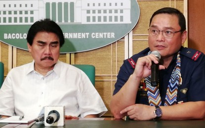 <p><strong>ANTI-DRUG DRIVE.</strong> Brig. Gen. Rene Pamuspusan, director of Police Regional Office in Western Visayas (PRO-6), urges the police in Bacolod City and Negros Occidental to extend their effort in the campaign against illegal drugs. He made the call during the press conference with Mayor Evelio Leonardia (left) at the Bacolod City Government Center on Monday (Oct. 21, 2019). <em>(Photo by Nanette L. Guadalquiver)</em></p>