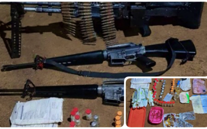 <p><strong>ARMS CACHE.</strong> Soldiers in Magpet, North Cotabato, seize a .30-caliber machine gun, two M-16 Armalite rifles and subversive documents on Monday (Oct. 21, 2019). A former New People’s Army combatant led them to the site where the firearms were kept. <em>(Photo courtesy of 72IB)</em></p>